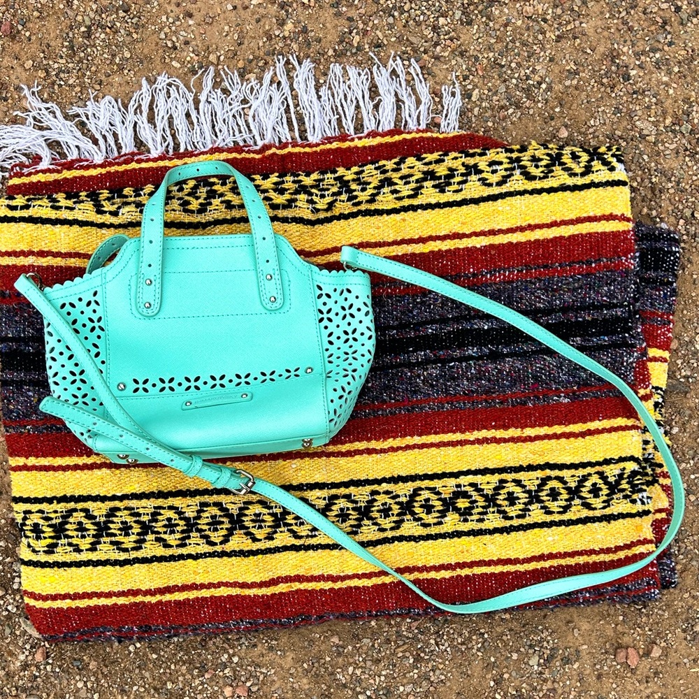 b. makowsky light blue bag with cut outs, detachable shoulder strap
